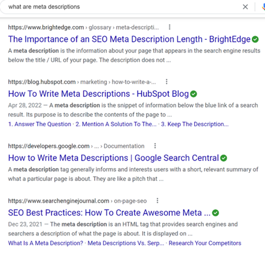 The image shows four search results, each with meta descriptions below the page title.